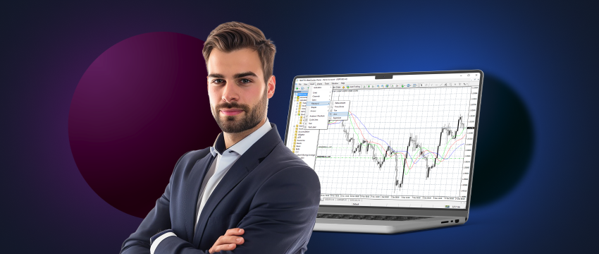 A man in a suit stands in front of a laptop displaying an open trading chart. He appears to be a CFD trader using the MT4 platform.